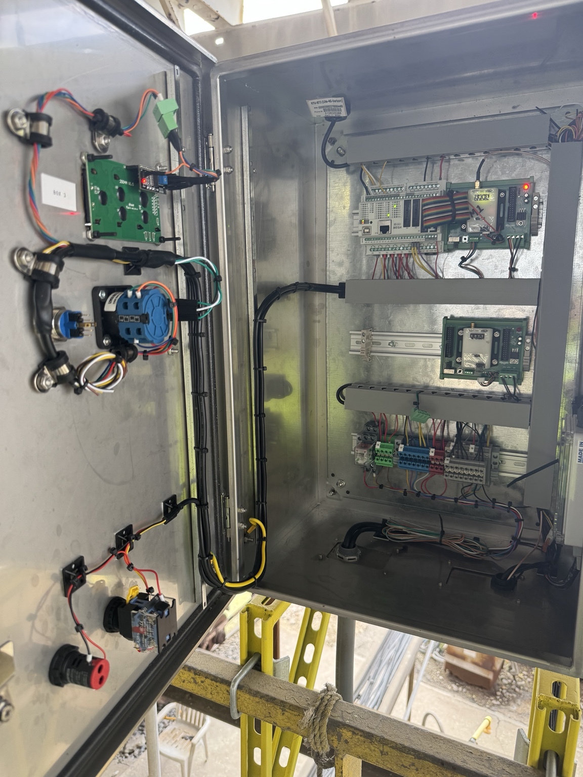 Custom industrial control enclosure with PLC and purpose-built circuit boards