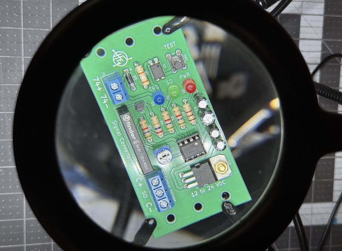HorkusFlux custom signal converter circuit board under magnification