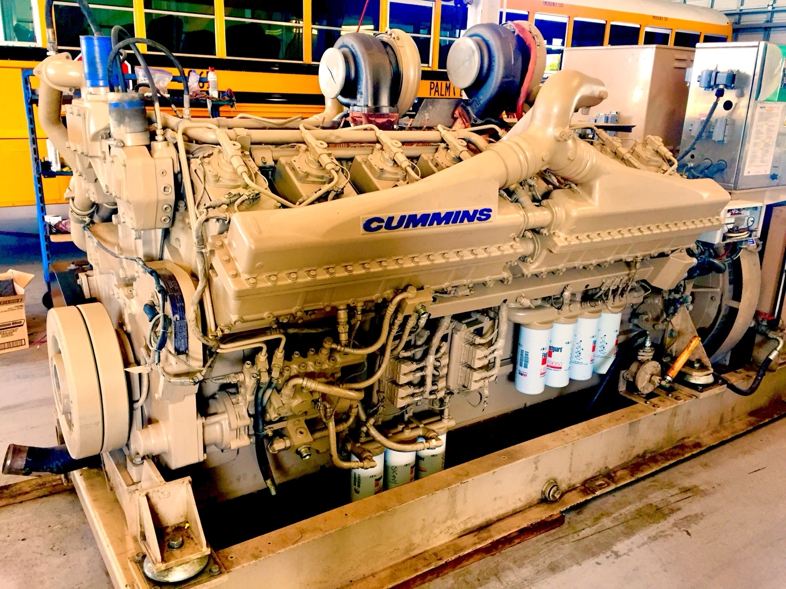 Rebuilt industrial generator engine in a service facility